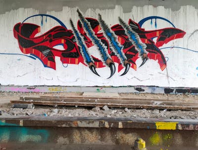 Red and Black Stylewriting by Dipa. This Graffiti is located in Berlin, Germany and was created in 2022. This Graffiti can be described as Stylewriting and Characters.
