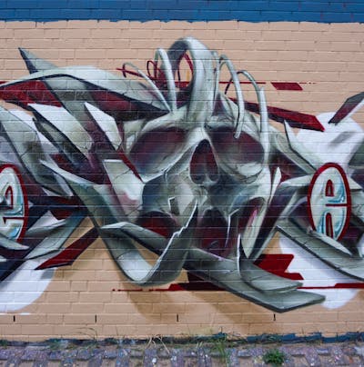 Grey and Red Stylewriting by Spektrum. This Graffiti is located in Rostock, Germany and was created in 2022. This Graffiti can be described as Stylewriting, Characters and 3D.