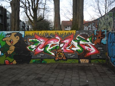 Colorful Stylewriting by News. This Graffiti is located in Tilburg, Netherlands and was created in 2014. This Graffiti can be described as Stylewriting, Characters and Wall of Fame.