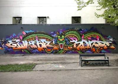 Colorful Stylewriting by Bond and Glurak. This Graffiti is located in Berlin, Germany and was created in 2022. This Graffiti can be described as Stylewriting, Characters and Wall of Fame.