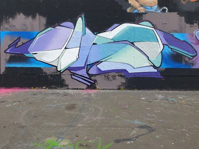 Violet and Colorful Stylewriting by Dirt. This Graffiti is located in Leipzig, Germany and was created in 2022. This Graffiti can be described as Stylewriting and Wall of Fame.