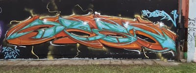 Orange and Cyan Stylewriting by Resn, WZN and ZDC. This Graffiti is located in Poland and was created in 2021. This Graffiti can be described as Stylewriting and Wall of Fame.