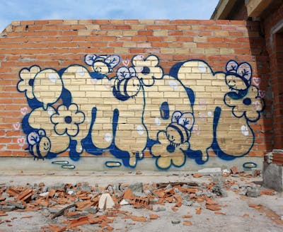 Gold and Blue Handstyles by imon boy. This Graffiti is located in Spain and was created in 2021. This Graffiti can be described as Handstyles and Stylewriting.