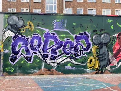 Violet and Green and Colorful Stylewriting by Sorez and smo__crew. This Graffiti is located in London, United Kingdom and was created in 2023. This Graffiti can be described as Stylewriting, Characters and Wall of Fame.