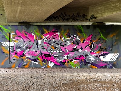 Coralle and Grey and Colorful Stylewriting by omseg. This Graffiti is located in Freiburg, Germany and was created in 2023. This Graffiti can be described as Stylewriting and Wall of Fame.