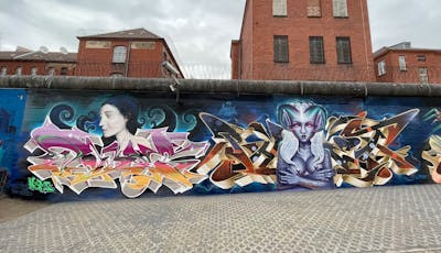 Colorful Stylewriting by dejoe, Cors One, Phet One and Eddie 37. This Graffiti is located in Berlin, Germany and was created in 2022. This Graffiti can be described as Stylewriting, Characters and Wall of Fame.