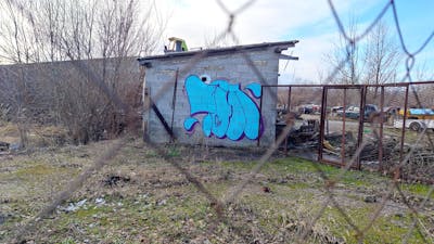 Light Blue Throw Up by 7AM. This Graffiti is located in Novi Sad, Serbia and was created in 2024. This Graffiti can be described as Throw Up and Abandoned.