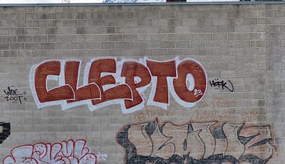 Brown and White Stylewriting by Clepto. This Graffiti is located in United States and was created in 2023. This Graffiti can be described as Stylewriting and Street Bombing.