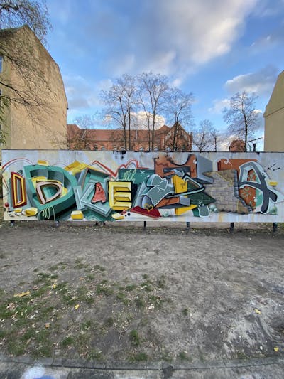 Cyan and Colorful Stylewriting by DKAY and EDGA. This Graffiti is located in Berlin, Germany and was created in 2024. This Graffiti can be described as Stylewriting, Wall of Fame and 3D.