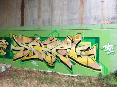 Light Green and Beige Stylewriting by Kst, Alf, Twp, STAPH and Yo. This Graffiti is located in Saint-Etienne, France and was created in 2021.