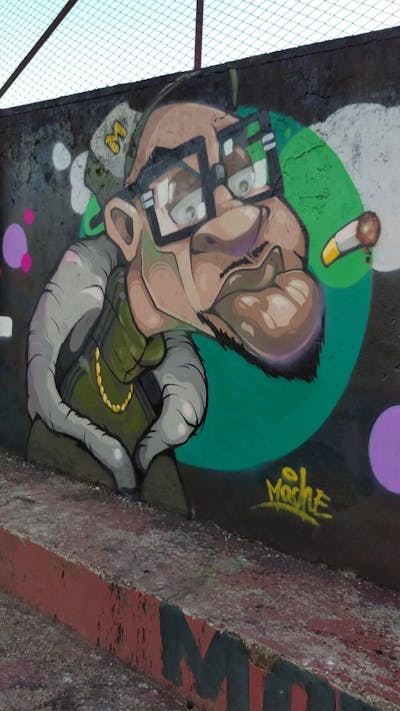 Colorful and Beige Characters by Mache. This Graffiti is located in Naples, Italy and was created in 2022.