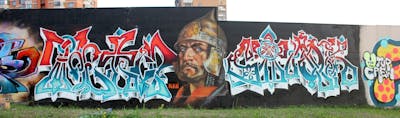 Red and Light Blue and Colorful Stylewriting by Nan, TWESO and SLOVO. This Graffiti is located in Moscow, Russian Federation and was created in 2013. This Graffiti can be described as Stylewriting, Characters, Streetart and Wall of Fame.
