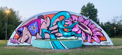 Colorful Characters by Zark. This Graffiti is located in Pieve Emanuele, Italy and was created in 2023. This Graffiti can be described as Characters and Streetart.