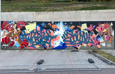 Colorful Stylewriting by Zark and MRWANYS. This Graffiti is located in Trento, Italy and was created in 2022. This Graffiti can be described as Stylewriting, Characters, Murals and Streetart.