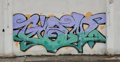 Violet and Cyan Stylewriting by Gizmo. This Graffiti is located in Thessaloniki, Greece and was created in 2023. This Graffiti can be described as Stylewriting and Abandoned.