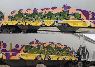 Yellow and Green Stylewriting by OVERT and Jeks. This Graffiti is located in United States and was created in 2022. This Graffiti can be described as Stylewriting, Trains and Freights.