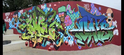 Colorful Stylewriting by OATS and SAO2971. This Graffiti is located in St helier, Jersey and was created in 2023. This Graffiti can be described as Stylewriting and Characters.