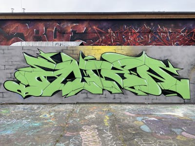 Light Green Stylewriting by Alien. This Graffiti is located in Potsdam, Germany and was created in 2022. This Graffiti can be described as Stylewriting and Wall of Fame.