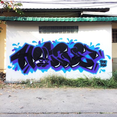 Violet and Black Stylewriting by DOD crew, Hootive and TMC. This Graffiti is located in Khon Kaen, Thailand and was created in 2022.