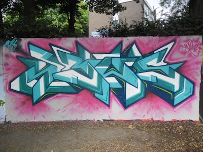 Cyan and Coralle Stylewriting by News. This Graffiti is located in Tilburg, Netherlands and was created in 2014. This Graffiti can be described as Stylewriting and Wall of Fame.