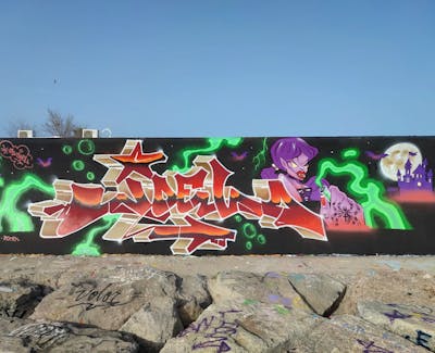 Colorful Stylewriting by El Joel. This Graffiti is located in Barcelona, Spain and was created in 2022. This Graffiti can be described as Stylewriting, Characters and Wall of Fame.