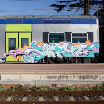 Cyan and Colorful Stylewriting by Zark. This Graffiti is located in Italy and was created in 2023. This Graffiti can be described as Stylewriting and Trains.