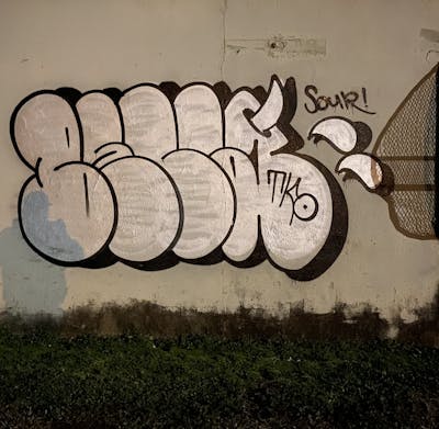 Chrome and Black Throw Up by Beca and Tko. This Graffiti is located in Tulsa, United States and was created in 2024.