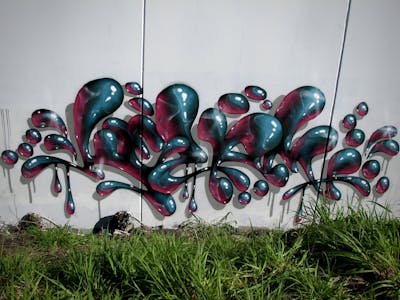 Cyan and Red Stylewriting by Kezam. This Graffiti is located in Auckland, New Zealand and was created in 2022. This Graffiti can be described as Stylewriting and 3D.