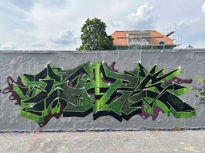 Green and Black and Light Green Stylewriting by Gaps. This Graffiti is located in Leipzig, Germany and was created in 2023. This Graffiti can be described as Stylewriting and Wall of Fame.