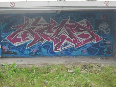 Violet and Blue Stylewriting by News. This Graffiti is located in Tilburg, Netherlands and was created in 2014. This Graffiti can be described as Stylewriting and Wall of Fame.