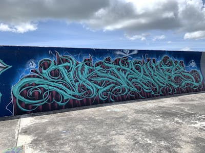 Cyan and Blue Stylewriting by stamp. This Graffiti is located in Japan and was created in 2022. This Graffiti can be described as Stylewriting and Wall of Fame.