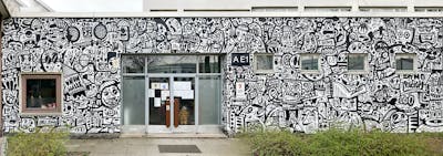 Black and White Characters by Hülpman, OST, PÜTK and 21er Gallery. This Graffiti is located in Berlin, Germany and was created in 2022. This Graffiti can be described as Characters, Streetart and Murals.