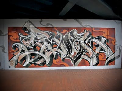 Grey and Red Stylewriting by Sbek. This Graffiti is located in Oldenburg, Germany and was created in 2021.