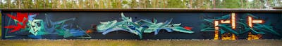 Cyan and Blue Stylewriting by Pank, Syck and Tenk. This Graffiti is located in Germany and was created in 2022.