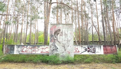 Red and White Handstyles by urine and OST. This Graffiti is located in Dessau, Germany and was created in 2020. This Graffiti can be described as Handstyles, Characters and Abandoned.