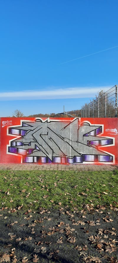 Chrome and Red Stylewriting by Ozler and CME CREW. This Graffiti is located in Oschatz, Germany and was created in 2022. This Graffiti can be described as Stylewriting and Wall of Fame.