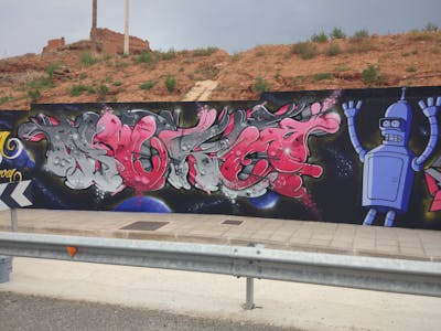 Grey and Coralle Stylewriting by BUKE. This Graffiti is located in Spain and was created in 2021. This Graffiti can be described as Stylewriting and Characters.