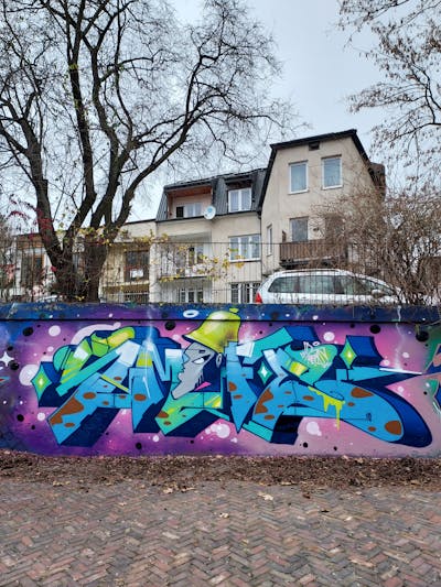 Light Blue and Colorful Stylewriting by Fems173. This Graffiti is located in lublin, Poland and was created in 2022. This Graffiti can be described as Stylewriting, Characters and Wall of Fame.