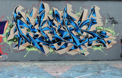 Beige and Light Blue Stylewriting by Chips and CDSK. This Graffiti is located in London, United Kingdom and was created in 2023. This Graffiti can be described as Stylewriting and Wall of Fame.