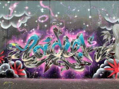 Cyan and Grey and Coralle Stylewriting by Lady.K and 156. This Graffiti is located in Berlin, Germany and was created in 2019. This Graffiti can be described as Stylewriting, Characters and Wall of Fame.