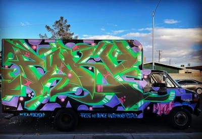 Light Green and Brown Stylewriting by Pocko and MIW Crew. This Graffiti is located in Las Vegas, United States and was created in 2023. This Graffiti can be described as Stylewriting and Cars.