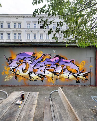 Violet and Orange and Beige Stylewriting by Crazy Mister Sketch. This Graffiti is located in Vienna, Austria and was created in 2022. This Graffiti can be described as Stylewriting and Wall of Fame.