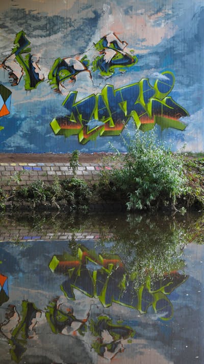 Light Blue and Light Green and Colorful Stylewriting by HAMPI. This Graffiti is located in Oldenburg, Germany and was created in 2023. This Graffiti can be described as Stylewriting and Atmosphere.