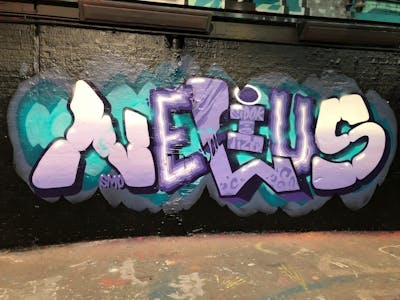 Violet and Cyan Stylewriting by Nelius and smo__crew. This Graffiti is located in London, United Kingdom and was created in 2021.